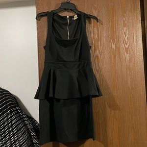 black peplum dress